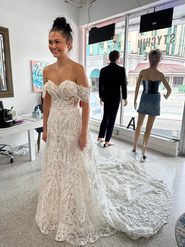 Bride in an off-the-shoulder lace gown